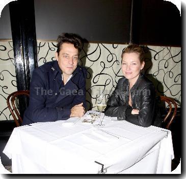 Jamie Hince and Kate Moss
 outside Scotts Restaurant to smoke a cigarette before finishing their dinner inside.