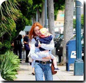 Marcia Cross takes her kid to the Color Me Mine art studio in Beverly Hills Los Angeles, California –