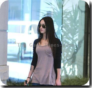 Brian Austin Green and Megan Fox
 returning to their hotel.