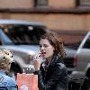 Mischa Barton enjoys a snack and a smoke with friends in the West Village New York City.