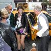 Mischa Barton enjoys a snack and a smoke with friends in the West Village New York City.