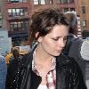 Mischa Barton enjoys a snack and a smoke with friends in the West Village New York City.