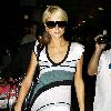 Paris Hilton 
arrives at LAX airport after catching a flight from London.