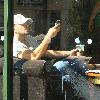 Peter Andre talking on his mobile phoneat a Starbucks coffeshopBrighton.