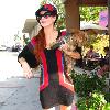 Phoebe Price out with her dog on Sunset Blvd.