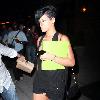 Rihanna 
leaves her Soho hotel holding a green folder.