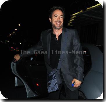 Robert Downey Jr.and his wife Susan Levi leave the Wyndham's Theatre after watching Jude Law perform in 'Hamlet'London.