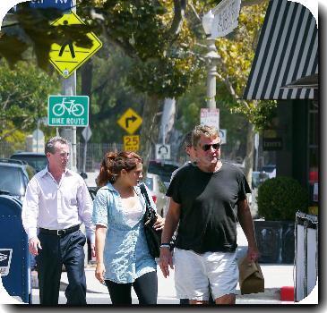 Ryan O'Neal takes food to go after having lunch with a friend.