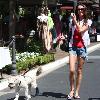 **Exclusive**Shannon Elizabeth walking her dog whose leg is strapped up while out shopping in HollywoodLos Angeles.