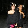 Amy Winehouse and her goddaughter Dionne Bromfieldholding hands as they walk along the street, after having meal at a restaurant. She earlier presented an award to The Specials at the Q Awards at Grosvenor House. London.