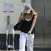 Ashley Tisdale on her way to her gym in Hollywood Los Angeles.