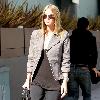 Nicky Hilton putting money in a parking meter while out and about in Beverly Hills Los Angeles. Nicky Hilton putting money in a parking meter while out and about in Beverly Hills Los Angeles.