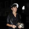 Singer Amy Winehouse smokes a cigarette after leaving the Fish Works Restaurant in Marylebone. London.