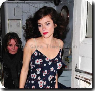 Anna Friel in a flowery dress, leaves the Theatre Royal after her latest stage performance in 'Breakfast At Tiffany's' London.