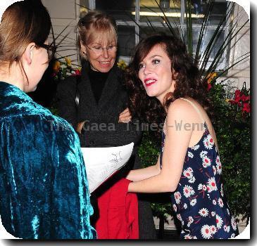 Anna Friel in a flowery dress, leaves the Theatre Royal after her latest stage performance in 'Breakfast At Tiffany's' London.