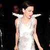 Anna Friel wearing a long white dress, angel wings and a feather mask, leaves the Theatre Royal after her latest stage performance in 'Breakfast At Tiffany's'London. Anna Friel wearing a long white dress, angel wings and a feather mask, leaves the Theatre Royal after her latest stage performance in 'Breakfast At Tiffany's'London.