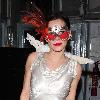 Anna Friel wearing a long white dress, angel wings and a feather mask, leaves the Theatre Royal after her latest stage performance in 'Breakfast At Tiffany's'London.