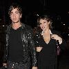 Kelly Brook and her boyfriend Danny Cipriani look surprised to be photographed as they leave J Sheekey restaurant hand in hand. Kelly was wearing a low cut dress, and appeared to realise this as she was being photographed, because she readjusted her dress to try and cover up a bit!.