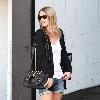 Nicky Hilton wearing black ankle boots and denim shorts, leaves the Chateau Marmont hotel in West Hollywood.