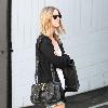 Nicky Hilton wearing black ankle boots and denim shorts, leaves the Chateau Marmont hotel in West Hollywood.