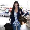 Jennifer Love Hewitt and boyfriend Jamie Kennedy catch a flight out of Burbank Airport.