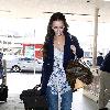 Jennifer Love Hewitt and boyfriend Jamie Kennedy catch a flight out of Burbank Airport.