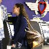 Jennifer Love Hewitt and boyfriend Jamie Kennedy catch a flight out of Burbank Airport.