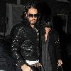 Katy Perry and Russell Brand return to his house after Russell collects Katy from her hotel..