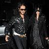 Katy Perry and Russell Brand return to his house after Russell collects Katy from her hotel..