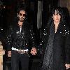 Katy Perry and Russell Brand return to his house after Russell collects Katy from her hotel..