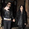 Katy Perry and Russell Brand return to his house after Russell collects Katy from her hotel..