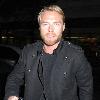 Ronan Keating outside the May Fair Hotel England.