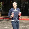 'House' star Jennifer Morrison, wearing no makeup, picks up coffee from Starbucks after going to the gym Los Angeles.