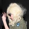 Lady Gaga is surrounded by paparazzi as she arrives at LAX airport after flying in from London Los Angeles.