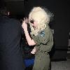 Lady Gaga is surrounded by paparazzi as she arrives at LAX airport after flying in from London Los Angeles.