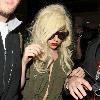 Lady Gaga is surrounded by paparazzi as she arrives at LAX airport after flying in from London Los Angeles.