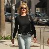 **Exclusive**Melanie Griffith enjoys a cigarette while out shopping in Beverly Hills Los Angeles.