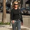 **Exclusive**Melanie Griffith enjoys a cigarette while out shopping in Beverly Hills Los Angeles.