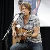 Keith Urban performing live at a Pasadena Verizon Wireless store; Verizon Wireless and Samsung Mobile Team with Keith Urban for an acoustic performance for fans. Los Angeles, California.