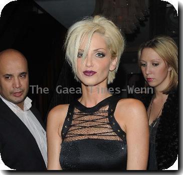 Sarah Harding celebrates her birthday at Kanaloa Nightclub, wearing a black dress. London.