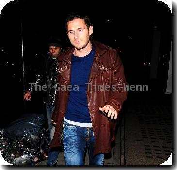 Frank Lampard leaving Cipriani restaurant in a large brown leather jacket London.