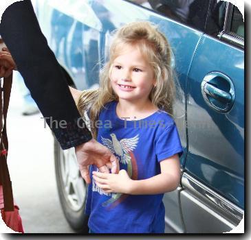 Jennifer Garner picks up her daughter, Violet Affleck, on her 4th birthday at her nursery school in Santa Monica while carrying her daughter, Seraphina Affleck..