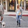 Ashley Tisdale and his father, Mike Tisdale, walk their dog in Toluca Lake.