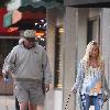 Ashley Tisdale and his father, Mike Tisdale, walk their dog in Toluca Lake.