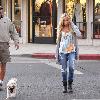 Ashley Tisdale and his father, Mike Tisdale, walk their dog in Toluca Lake.