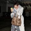 Jessica Alba 
looking through her Escada handbag while leaving Whole Foods Market in Beverly Hills after shopping for groceries.