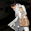 Jessica Alba 
looking through her Escada handbag while leaving Whole Foods Market in Beverly Hills after shopping for groceries.