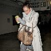 Jessica Alba 
looking through her Escada handbag while leaving Whole Foods Market in Beverly Hills after shopping for groceries.