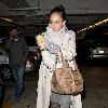 Jessica Alba 
looking through her Escada handbag while leaving Whole Foods Market in Beverly Hills after shopping for groceries.