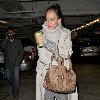 Jessica Alba 
looking through her Escada handbag while leaving Whole Foods Market in Beverly Hills after shopping for groceries.